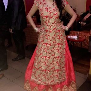 Beautiful red lengha with long kurta. No dupatta